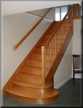 Flame Red Birch custom straight stair set with USS 14 profiled rails